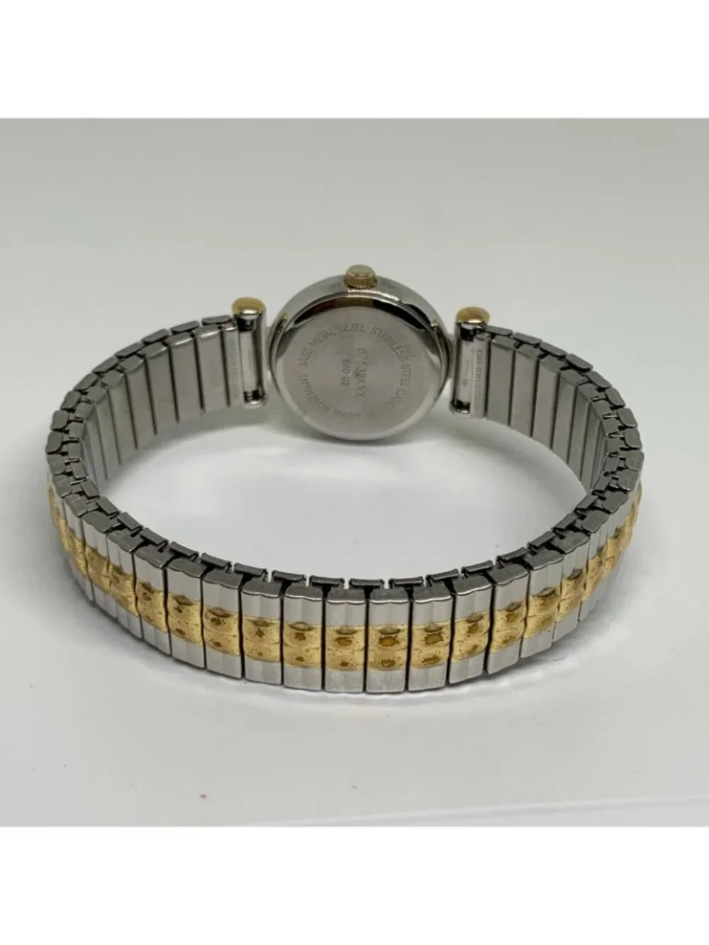 Women’s quartz analog watch silver gold tone 23mm stretch band running